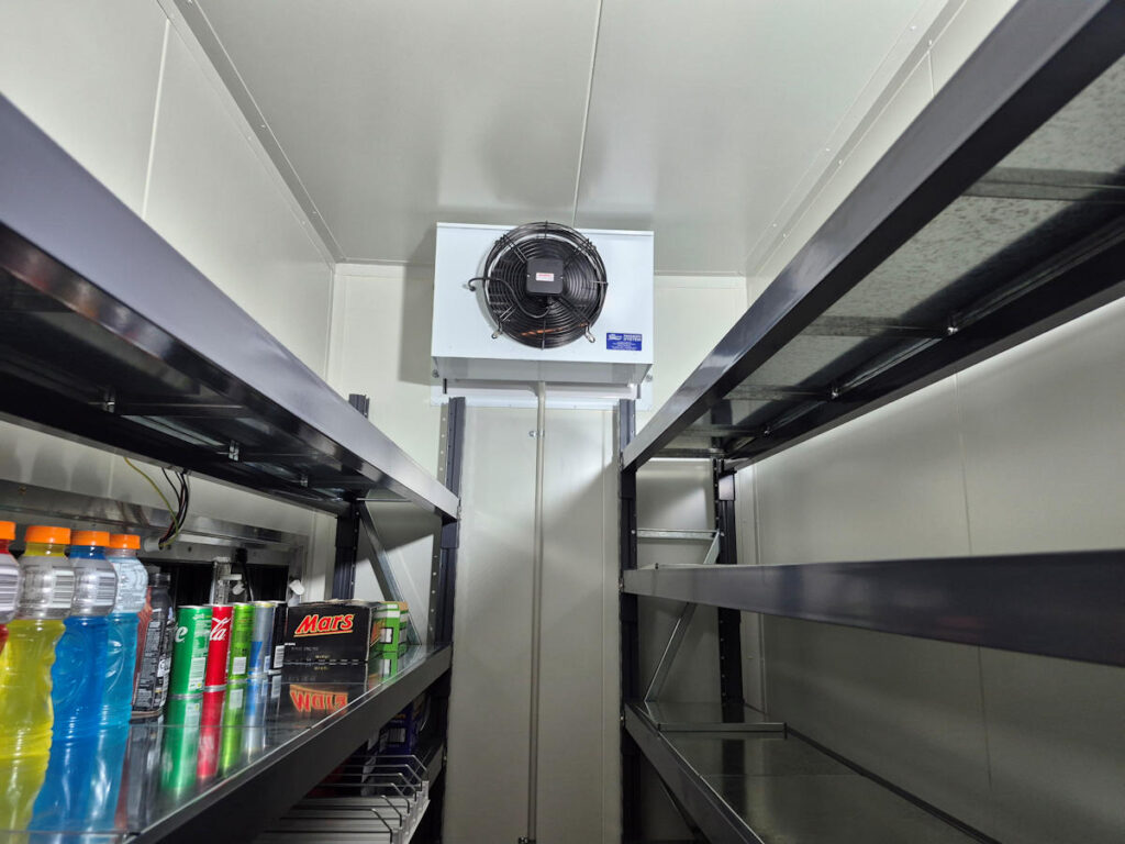 Interior of mobile cool room showing adjustable shelving for cool room hire in Perth WA